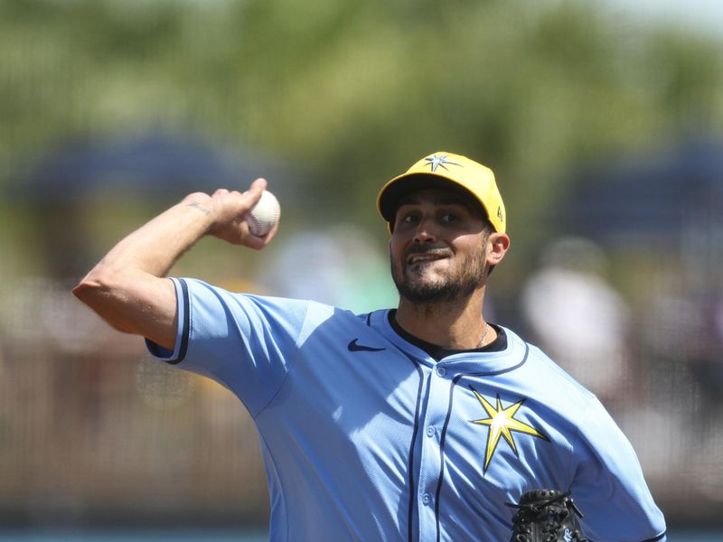 Mar 11, 2024; Port Charlotte, Florida, USA;  Tampa Bay Rays starting pitcher Zach Eflin (24) throws a pitch against the Toronto Blue Jays in the third inning at Charlotte Sports Park. Mandatory Credit: Nathan Ray Seebeck-USA TODAY Sports