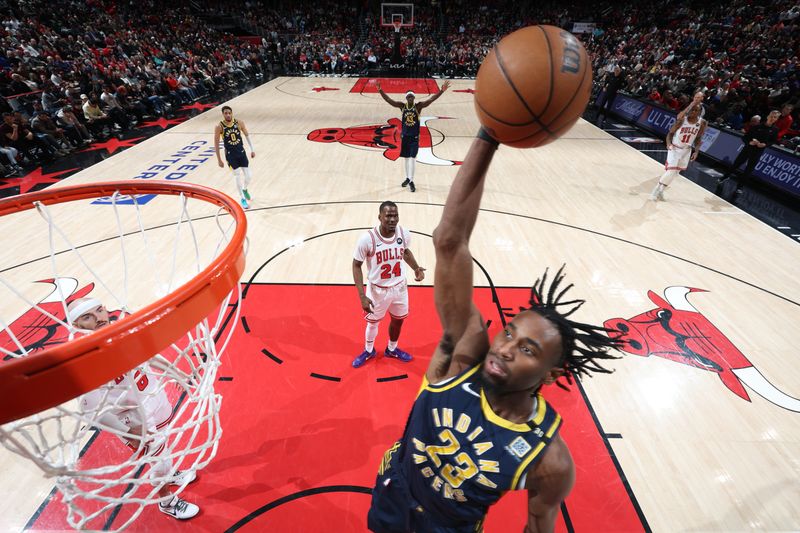 CHICAGO, IL - MARCH 27: Aaron Nesmith #23 of the Indiana Pacers drives to the basket during the game against the Chicago Bulls on March 27, 2024 at United Center in Chicago, Illinois. NOTE TO USER: User expressly acknowledges and agrees that, by downloading and or using this photograph, User is consenting to the terms and conditions of the Getty Images License Agreement. Mandatory Copyright Notice: Copyright 2024 NBAE (Photo by Jeff Haynes/NBAE via Getty Images)