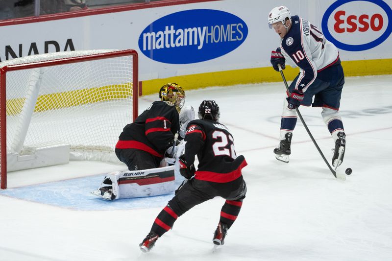 Dec 29, 2025; Ottawa, Ontario, CAN; Columbus Blue Jackets left wing Dmitri Voronkov (10) skates with the puck in front of Ottawa Senators goalie Leevi Merilainen (1) in the third period at the Canadian Tire Centre. Mandatory Credit: Marc DesRosiers-IMAGN Images