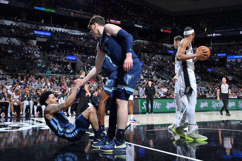 SAN ANTONIO, TX - MARCH 22  Scotty Pippen Jr. #1 of the Memphis Grizzlies is help up during the game against the San Antonio Spurs on March 22, 2024 at the Frost Bank Center in San Antonio, Texas. NOTE TO USER: User expressly acknowledges and agrees that, by downloading and or using this photograph, user is consenting to the terms and conditions of the Getty Images License Agreement. Mandatory Copyright Notice: Copyright 2024 NBAE (Photos by Michael Gonzales/NBAE via Getty Images)