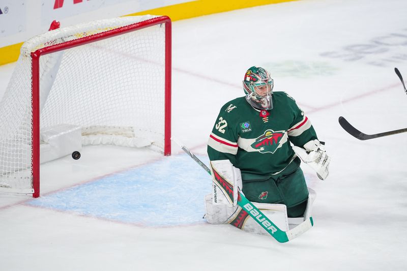 Nov 5, 2024; Saint Paul, Minnesota, USA; Minnesota Wild goaltender Filip Gustavsson (32) gives up a goal against the Los Angeles Kings right wing Quinton Byfield (55) in the third period at Xcel Energy Center. Mandatory Credit: Brad Rempel-Imagn Images