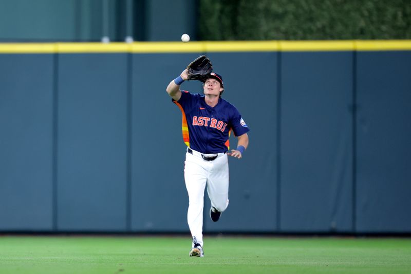 Jul 28, 2024; Houston, Texas, USA; Houston Astros outfielder Jake Meyers (6) catches a fly ball for an out against the Los Angeles Dodgers during the third inning at Minute Maid Park. Mandatory Credit: Erik Williams-USA TODAY Sports