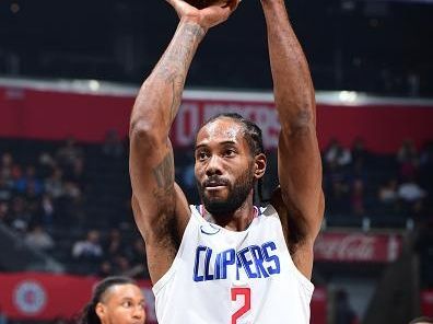 LOS ANGELES, CA - DECEMBER 11: Kawhi Leonard #2 of the LA Clippers shoots a free throw during the game against the Portland Trail Blazers on December 11, 2023 at Crypto.Com Arena in Los Angeles, California. NOTE TO USER: User expressly acknowledges and agrees that, by downloading and/or using this Photograph, user is consenting to the terms and conditions of the Getty Images License Agreement. Mandatory Copyright Notice: Copyright 2023 NBAE (Photo by Adam Pantozzi/NBAE via Getty Images)