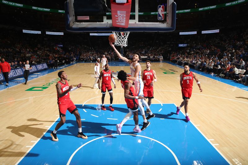 OKLAHOMA CITY, OK - OCTOBER 9: Chet Holmgren #7 of the Oklahoma City Thunder shoots the ball during the game against the Houston Rockets during a NBA pre season game on October 9, 2024 at Paycom Center in Oklahoma City, Oklahoma. NOTE TO USER: User expressly acknowledges and agrees that, by downloading and or using this photograph, User is consenting to the terms and conditions of the Getty Images License Agreement. Mandatory Copyright Notice: Copyright 2024 NBAE (Photo by Zach Beeker/NBAE via Getty Images)