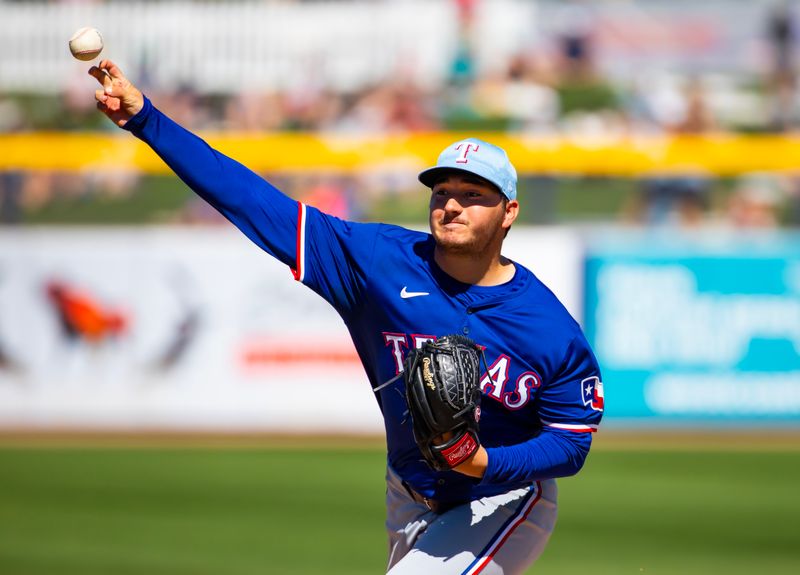 Mar 5, 2024; Peoria, Arizona, USA; Texas Rangers pitcher Owen White against the Seattle Mariners during a spring training baseball game at Peoria Sports Complex. Mandatory Credit: Mark J. Rebilas-USA TODAY Sports