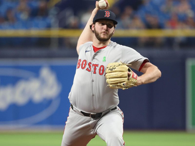 May 20, 2024; St. Petersburg, Florida, USA;  Boston Red Sox pitcher Justin Slaten (63) throws a pitch against the Tampa Bay Rays during the ninth inning at Tropicana Field. Mandatory Credit: Kim Klement Neitzel-USA TODAY Sports