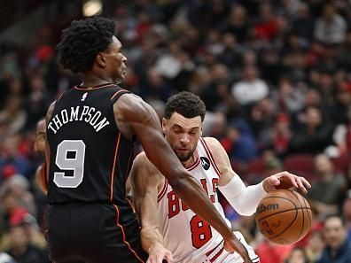 CHICAGO, ILLINOIS - NOVEMBER 12: Zach LaVine #8 of the Chicago Bulls drives in the first half against Ausar Thompson #9 of the Detroit Pistons at the United Center on November 12, 2023 in Chicago, Illinois.  NOTE TO USER: User expressly acknowledges and agrees that, by downloading and or using this photograph, User is consenting to the terms and conditions of the Getty Images License Agreement.  (Photo by Quinn Harris/Getty Images)