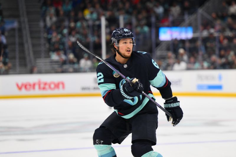 Oct 26, 2024; Seattle, Washington, USA; Seattle Kraken defenseman Brandon Montour (62) during the third period against the Carolina Hurricanes at Climate Pledge Arena. Mandatory Credit: Steven Bisig-Imagn Images