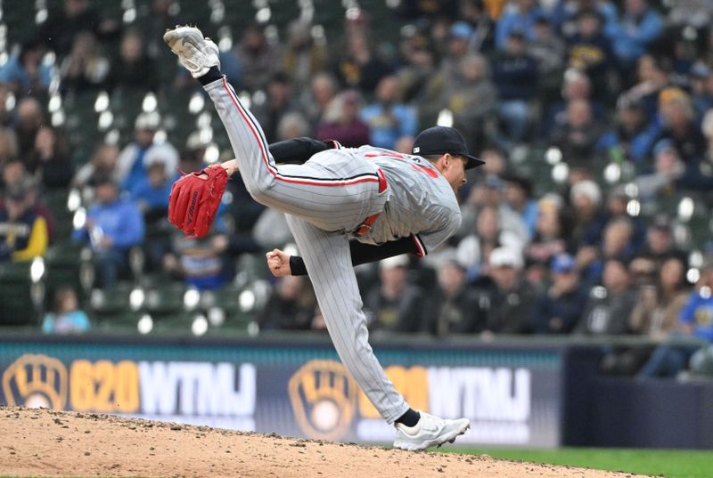 Apr 3, 2024; Milwaukee, Wisconsin, USA; Minnesota Twins relief pitcher Griffin Jax (22) delivers a pitch against the Milwaukee Brewers in the eighth inning at American Family Field. Mandatory Credit: Michael McLoone-USA TODAY Sports