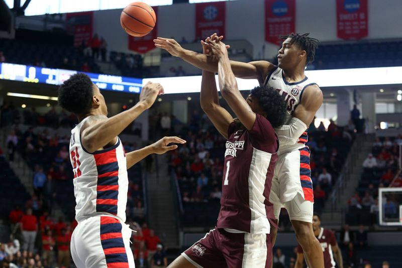 Feb 18, 2023; Oxford, Mississippi, USA; Mississippi State Bulldogs forward Tolu Smith (1) and Mississippi Rebels guard Matthew Murrell (11) battle for a rebound during the first half at The Sandy and John Black Pavilion at Ole Miss. Mandatory Credit: Petre Thomas-USA TODAY Sports