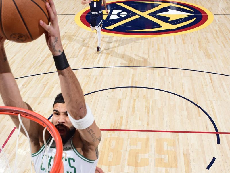 DENVER, CO - JANUARY 7: Jayson Tatum #0 of the Boston Celtics drives to the basket during the game against the Denver Nuggets on January 7, 2025 at Ball Arena in Denver, Colorado. NOTE TO USER: User expressly acknowledges and agrees that, by downloading and/or using this Photograph, user is consenting to the terms and conditions of the Getty Images License Agreement. Mandatory Copyright Notice: Copyright 2025 NBAE (Photo by Garrett Ellwood/NBAE via Getty Images)