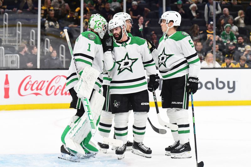 Oct 24, 2024; Boston, Massachusetts, USA;  Dallas Stars goaltender Casey DeSmith (1) and center Colin Blackwell (15) congratulate each other after defeating the Boston Bruins at TD Garden. Mandatory Credit: Bob DeChiara-Imagn Images