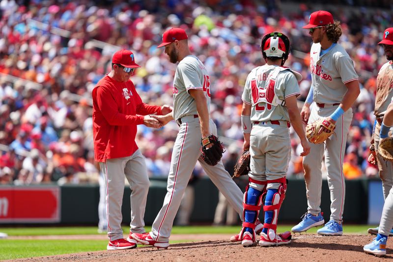 Jun 16, 2024; Baltimore, Maryland, USA; Philadelphia Phillies manager Rob Thomson (59) takes out pitcher Zach Wheeler (45) from the game during the fifth inning against the Baltimore Orioles at Oriole Park at Camden Yards. Mandatory Credit: Gregory Fisher-USA TODAY Sports