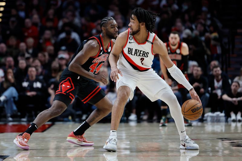 PORTLAND, OREGON - MARCH 24: Trendon Watford #2 of the Portland Trail Blazers moves the ball against the defense of Patrick Williams #44 of the Chicago Bulls during the first half at Moda Center on March 24, 2023 in Portland, Oregon. NOTE TO USER: User expressly acknowledges and agrees that, by downloading and or using this photograph, User is consenting to the terms and conditions of the Getty Images License Agreement. (Photo by Soobum Im/Getty Images)