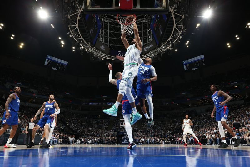 MINNEAPOLIS, MN -  MARCH 3: Rudy Gobert #27 of the Minnesota Timberwolves dunks the ball during the game against the LA Clippers on March 3, 2024 at Target Center in Minneapolis, Minnesota. NOTE TO USER: User expressly acknowledges and agrees that, by downloading and or using this Photograph, user is consenting to the terms and conditions of the Getty Images License Agreement. Mandatory Copyright Notice: Copyright 2024 NBAE (Photo by David Sherman/NBAE via Getty Images)