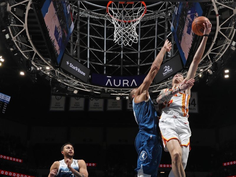 MINNEAPOLIS, MN -  APRIL 12: Garrison Mathews #25 of the Atlanta Hawks drives to the basket during the game against the Minnesota Timberwolves on April 12, 2024 at Target Center in Minneapolis, Minnesota. NOTE TO USER: User expressly acknowledges and agrees that, by downloading and or using this Photograph, user is consenting to the terms and conditions of the Getty Images License Agreement. Mandatory Copyright Notice: Copyright 2024 NBAE (Photo by Jordan Johnson/NBAE via Getty Images)