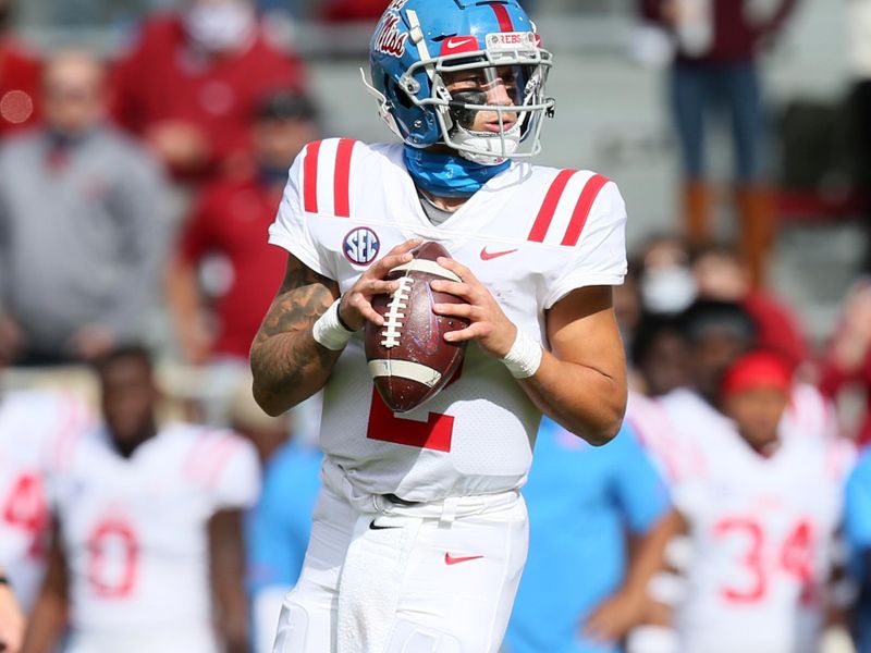 Oct 17, 2020; Fayetteville, Arkansas, USA; Ole Miss Rebels  quarterback Matt Corral (2) looks to pass during the first quarter against the Arkansas Razorbacks at Donald W. Reynolds Razorback Stadium. Mandatory Credit: Nelson Chenault-USA TODAY Sports