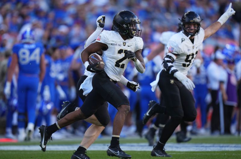 Nov 4, 2023; Denver, Colorado, USA; Army Black Knights defensive back Bo Nicolas-Paul (2) following his interception in the fourth quarter at Empower Field at Mile High. Mandatory Credit: Ron Chenoy-USA TODAY Sports