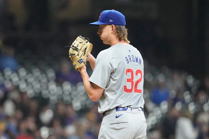 May 28, 2024; Milwaukee, Wisconsin, USA;  Chicago Cubs pitcher Ben Brown (32) prepares to throw a pitch during the seventh inning against the Milwaukee Brewers at American Family Field. Mandatory Credit: Jeff Hanisch-USA TODAY Sports