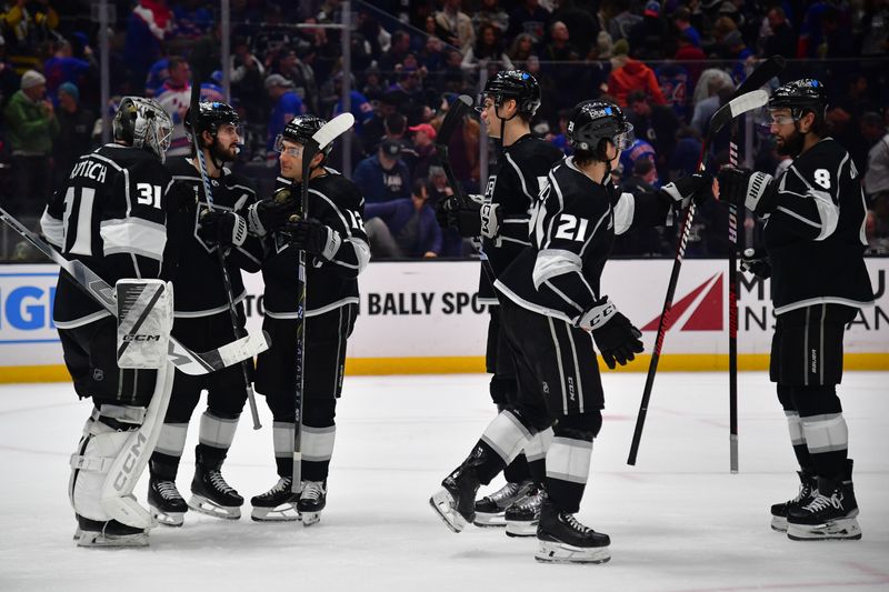 Jan 20, 2024; Los Angeles, California, USA; Los Angeles Kings celebrate the victory against the New York Rangers at Crypto.com Arena. Mandatory Credit: Gary A. Vasquez-USA TODAY Sports