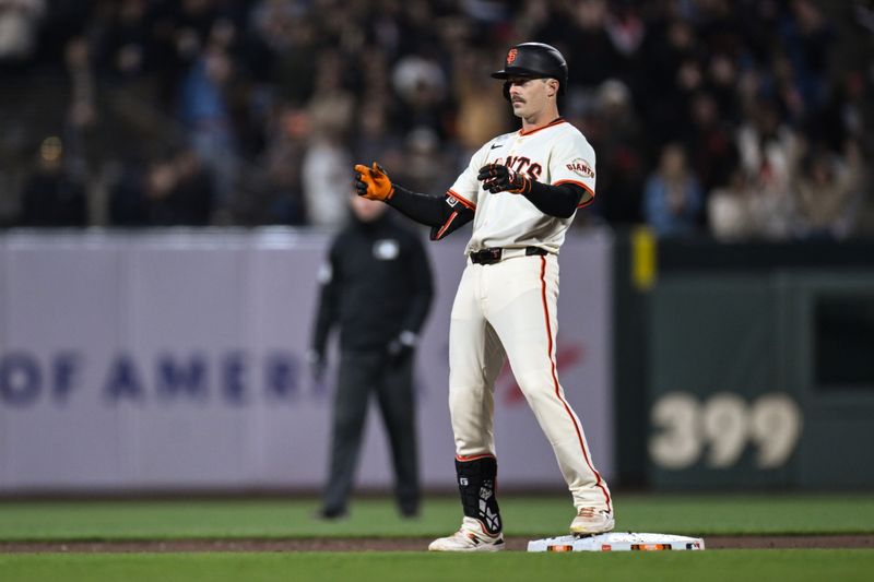 May 1, 2025; San Francisco, California, USA; San Francisco Giants right fielder Mike Yastrzemski (5) celebrates his RBI double against the Colorado Rockies in the sixth inning at Oracle Park. Mandatory Credit: Eakin Howard-Imagn Images