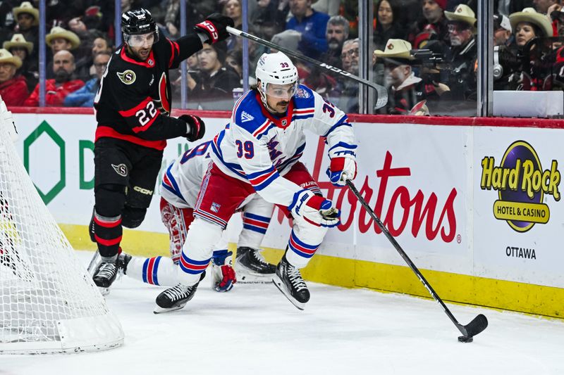 Dec 4, 2025; Ottawa, Ontario, CAN; New York Rangers center Sam Carrick (39) skates away with the puck against the Ottawa Senators during the first period at Canadian Tire Centre. Mandatory Credit: David Kirouac-Imagn Images