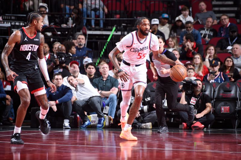 HOUSTON, TX - NOVEMBER 15: Derrick Jones Jr. #55 of the LA Clippers dribbles the ball during the game against the Houston Rockets during the Emirates NBA Cup game on November 15, 2024 at the Toyota Center in Houston, Texas. NOTE TO USER: User expressly acknowledges and agrees that, by downloading and or using this photograph, User is consenting to the terms and conditions of the Getty Images License Agreement. Mandatory Copyright Notice: Copyright 2024 NBAE (Photo by Logan Riely/NBAE via Getty Images)