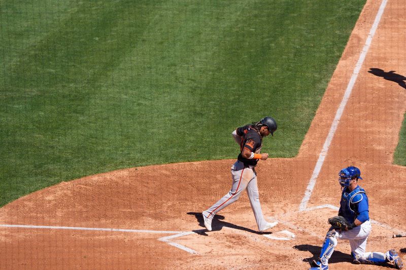 Mar 22, 2024; Mesa, Arizona, USA; San Francisco Giants infielder Luis Matos (29) scores after a walk in the third inning during a spring training game against the Chicago Cubs at Sloan Park. Mandatory Credit: Allan Henry-USA TODAY Sports