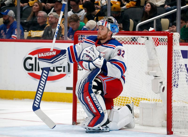 Mar 16, 2024; Pittsburgh, Pennsylvania, USA;  New York Rangers goaltender Jonathan Quick (32) looks on during a time-out against the Pittsburgh Penguins in the first period at PPG Paints Arena. Mandatory Credit: Charles LeClaire-USA TODAY Sports