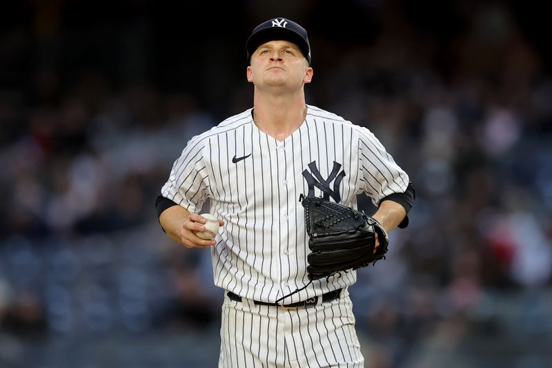 May 3, 2023; Bronx, New York, USA; New York Yankees starting pitcher Clarke Schmidt (36) reacts during the first inning against the Cleveland Guardians at Yankee Stadium. Mandatory Credit: Brad Penner-USA TODAY Sports