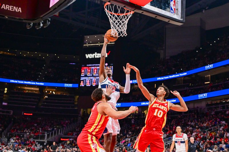 ATLANTA, GA - OCTOBER 28:  Alexandre Sarr #20 of the Washington Wizards on October 28, 2024 at State Farm Arena in Atlanta, Georgia.  NOTE TO USER: User expressly acknowledges and agrees that, by downloading and/or using this Photograph, user is consenting to the terms and conditions of the Getty Images License Agreement. Mandatory Copyright Notice: Copyright 2024 NBAE (Photo by Adam Hagy/NBAE via Getty Images)