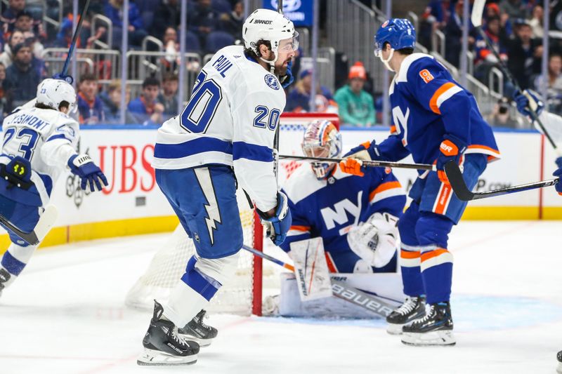 Feb 24, 2024; Elmont, New York, USA;  Tampa Bay Lightning left wing Nicholas Paul (20) scores a goal in the first period against the New York Islanders at UBS Arena. Mandatory Credit: Wendell Cruz-USA TODAY Sports