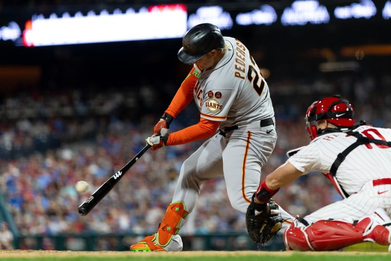 Aug 22, 2023; Philadelphia, Pennsylvania, USA; San Francisco Giants designated hitter Joc Pederson (23) hits a two RBI double during the fifth inning against the Philadelphia Phillies at Citizens Bank Park. Mandatory Credit: Bill Streicher-USA TODAY Sports