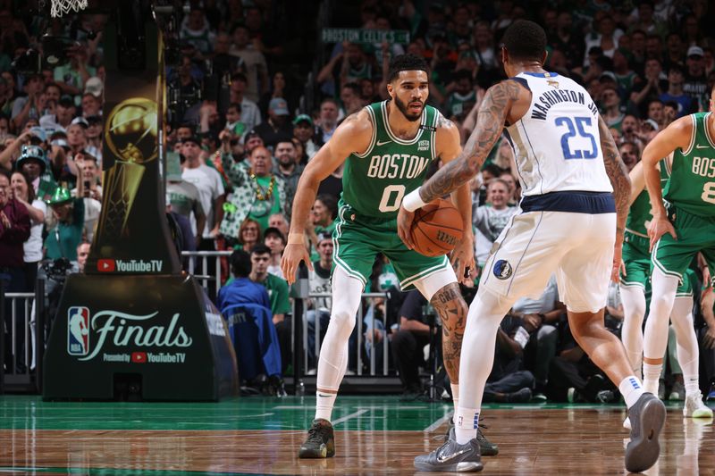 BOSTON, MA - JUNE 17: Jayson Tatum #0 of the Boston Celtics plays defense during the game against the Dallas Mavericks during Game 5 of the 2024 NBA Finals on June 17, 2024 at the TD Garden in Boston, Massachusetts. NOTE TO USER: User expressly acknowledges and agrees that, by downloading and or using this photograph, User is consenting to the terms and conditions of the Getty Images License Agreement. Mandatory Copyright Notice: Copyright 2024 NBAE  (Photo by Nathaniel S. Butler/NBAE via Getty Images)