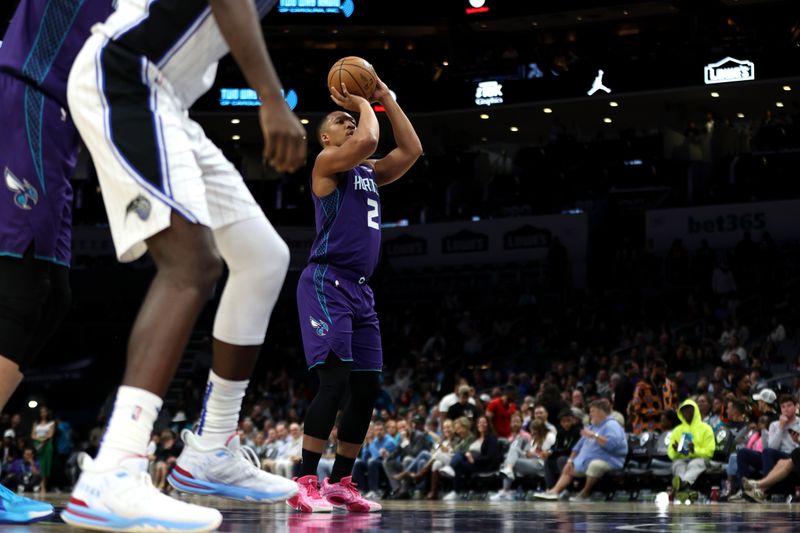 CHARLOTTE, NORTH CAROLINA - MARCH 05: Grant Williams #2 of the Charlotte Hornets shoots a free throw during the first half of an NBA game against the Orlando Magic at Spectrum Center on March 05, 2024 in Charlotte, North Carolina. NOTE TO USER: User expressly acknowledges and agrees that, by downloading and or using this photograph, User is consenting to the terms and conditions of the Getty Images License Agreement. (Photo by David Jensen/Getty Images)