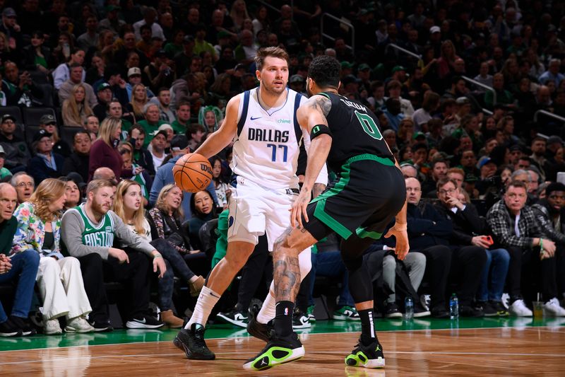 BOSTON, MA - MARCH 1: Luka Doncic #77 of the Dallas Mavericks dribbles the ball during the game against the Boston Celtics on March 1, 2024 at the TD Garden in Boston, Massachusetts. NOTE TO USER: User expressly acknowledges and agrees that, by downloading and or using this photograph, User is consenting to the terms and conditions of the Getty Images License Agreement. Mandatory Copyright Notice: Copyright 2024 NBAE  (Photo by Brian Babineau/NBAE via Getty Images)