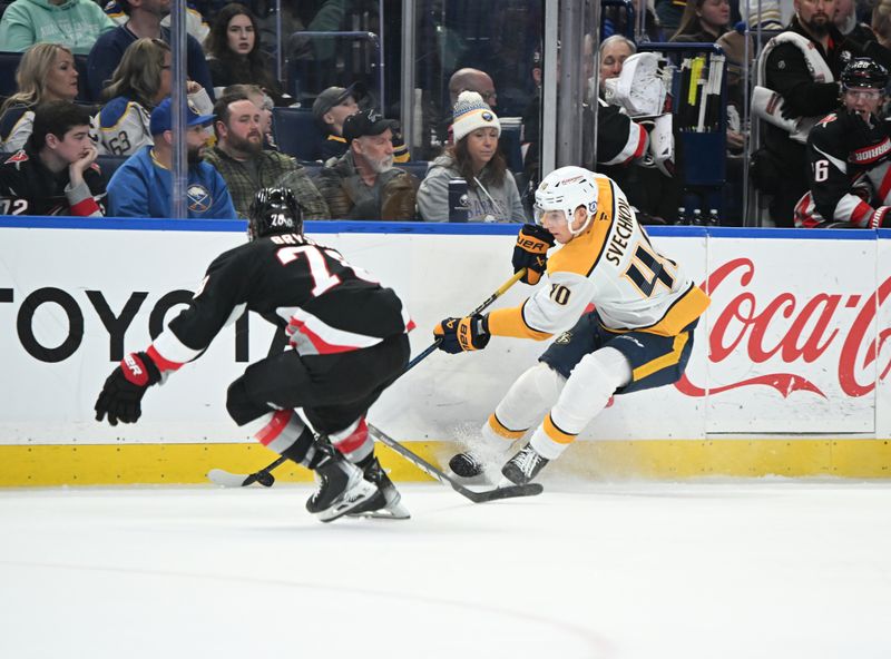 Jan 31, 2025; Buffalo, New York, USA; Nashville Predators center Colton Sissons (10) tries to skate past Buffalo Sabres defenseman Jacob Bryson (78) in the third period at the KeyBank Center. Mandatory Credit: Mark Konezny-Imagn Images