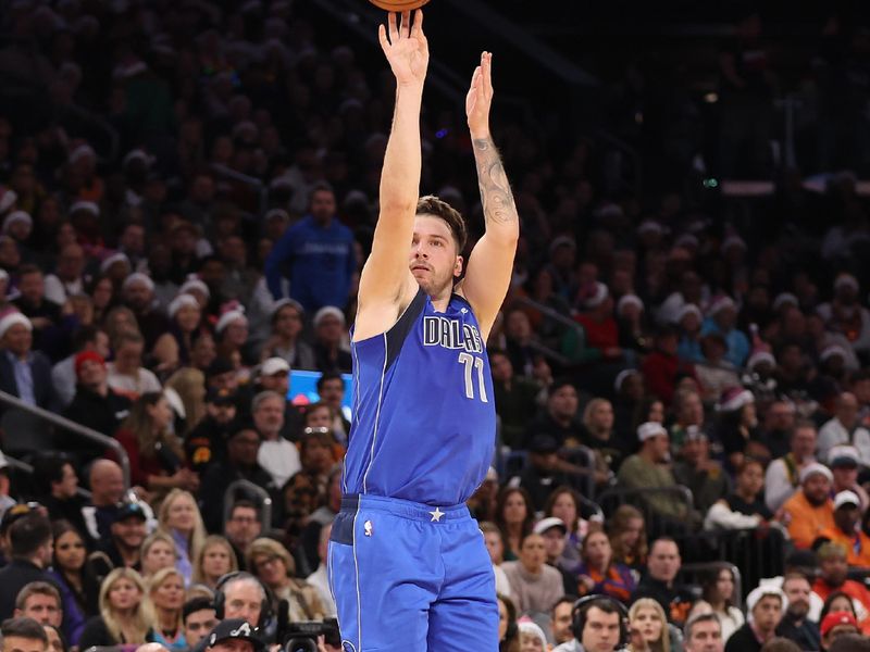 PHOENIX, ARIZONA - DECEMBER 25: Luka Doncic #77 of the Dallas Mavericks puts up a three-point shot against the Phoenix Suns during the first half of the NBA game at Footprint Center on December 25, 2023 in Phoenix, Arizona. NOTE TO USER: User expressly acknowledges and agrees that, by downloading and or using this photograph, User is consenting to the terms and conditions of the Getty Images License Agreement.  (Photo by Christian Petersen/Getty Images)