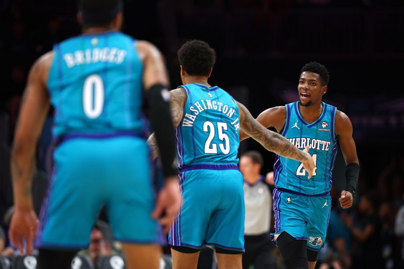 CHARLOTTE, NORTH CAROLINA - JANUARY 26: Brandon Miller #24 of the Charlotte Hornets reacts with his team following a basket during the first quarter of the game against the Houston Rockets at Spectrum Center on January 26, 2024 in Charlotte, North Carolina. NOTE TO USER: User expressly acknowledges and agrees that, by downloading and or using this photograph, User is consenting to the terms and conditions of the Getty Images License Agreement. (Photo by Jared C. Tilton/Getty Images)