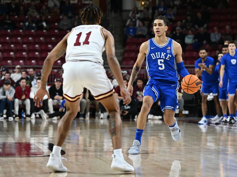 Jan 7, 2023; Chestnut Hill, Massachusetts, USA; Duke Blue Devils guard Tyrese Proctor (5) dribbles the ball against Boston College Eagles guard Makai Ashton-Langford (11) during the first half at the Conte Forum. Mandatory Credit: Brian Fluharty-USA TODAY Sports