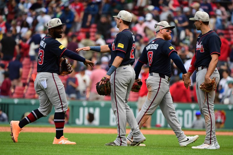May 18, 2025; Boston, Massachusetts, USA; The Atlanta Braves celebrate after defeating the Boston Red Sox at Fenway Park. Mandatory Credit: Bob DeChiara-Imagn Images