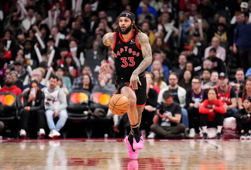 TORONTO, ON - FEBRUARY 10: Gary Trent Jr. #33 of the Toronto Raptors dribbles against the Cleveland Cavaliers during the second half of their basketball game at the Scotiabank Arena on February 10, 2024 in Toronto, Ontario, Canada. NOTE TO USER: User expressly acknowledges and agrees that, by downloading and/or using this Photograph, user is consenting to the terms and conditions of the Getty Images License Agreement. (Photo by Mark Blinch/Getty Images)