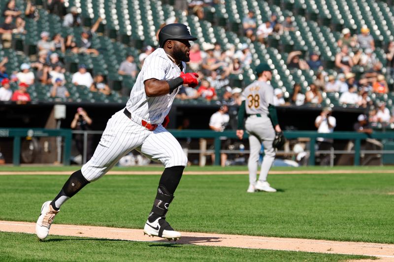 Sep 15, 2024; Chicago, Illinois, USA; Chicago White Sox third baseman Bryan Ramos (44) rounds the bases after hitting a solo home run against the Oakland Athletics during the sixth inning at Guaranteed Rate Field. Mandatory Credit: Kamil Krzaczynski-Imagn Images