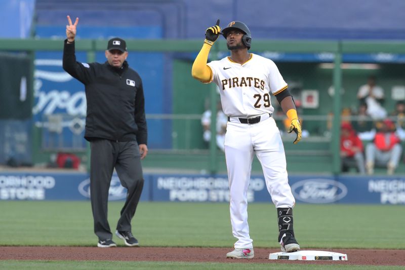 May 19, 2025; Pittsburgh, Pennsylvania, USA;  Pittsburgh Pirates center fielder Alexander Canario (29) reacts at second base after hitting a double against the Cincinnati Reds during the fourth inning at PNC Park. Mandatory Credit: Charles LeClaire-Imagn Images