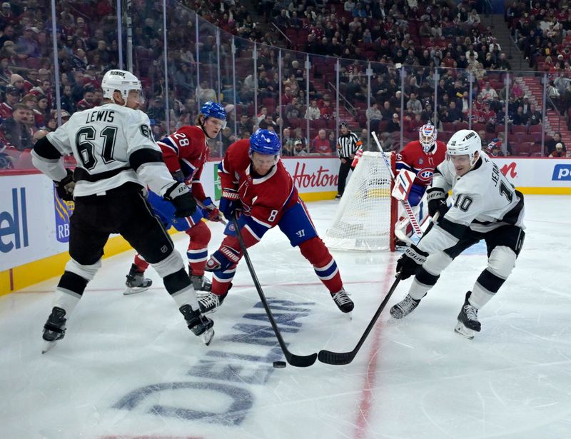 Oct 17, 2024; Montreal, Quebec, CAN; Montreal Canadiens defenseman Mike Matheson (8) takes the puck away from Los Angeles Kings forward Tanner Jeannot (10) and Los Angeles Kings forward Trevor Lewis (61)during the first period at the Bell Centre. Mandatory Credit: Eric Bolte-Imagn Images