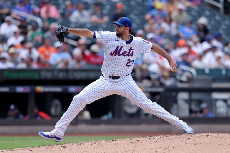 Jul 28, 2024; New York City, New York, USA; New York Mets starting pitcher David Peterson (23) pitches against the Atlanta Braves during the third inning at Citi Field. Mandatory Credit: Brad Penner-USA TODAY Sports