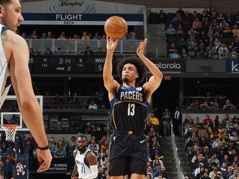 INDIANAPOLIS, IN - MARCH 27: Jordan Nwora #13 of the Indiana Pacers shoots the ball during the game against the Dallas Mavericks on March 27, 2023 at Gainbridge Fieldhouse in Indianapolis, Indiana. NOTE TO USER: User expressly acknowledges and agrees that, by downloading and or using this Photograph, user is consenting to the terms and conditions of the Getty Images License Agreement. Mandatory Copyright Notice: Copyright 2023 NBAE (Photo by Ron Hoskins/NBAE via Getty Images)