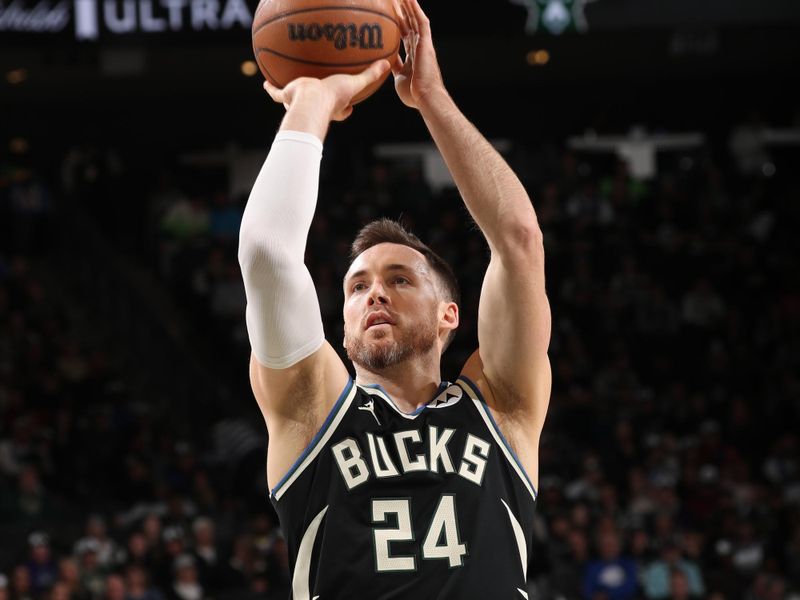 MILWAUKEE, WI - JANUARY 15:  Pat Connaughton #24 of the Milwaukee Bucks shoots a free throw during the game against the Orlando Magic on January 15, 2025 at Fiserv Forum Center in Milwaukee, Wisconsin. NOTE TO USER: User expressly acknowledges and agrees that, by downloading and or using this Photograph, user is consenting to the terms and conditions of the Getty Images License Agreement. Mandatory Copyright Notice: Copyright 2025 NBAE (Photo by Gary Dineen/NBAE via Getty Images).