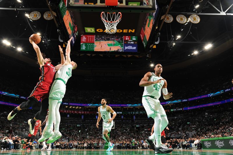 BOSTON, MA - APRIL 21: Jaime Jaquez Jr. #11 of the Miami Heat drives to the basket during the game against the Boston Celtics during Round 1 Game 1 of the 2024 NBA Playoffs on April 21, 2024 at the TD Garden in Boston, Massachusetts. NOTE TO USER: User expressly acknowledges and agrees that, by downloading and or using this photograph, User is consenting to the terms and conditions of the Getty Images License Agreement. Mandatory Copyright Notice: Copyright 2024 NBAE  (Photo by Brian Babineau/NBAE via Getty Images)