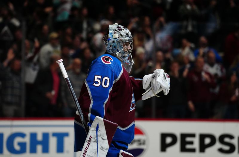 Dec 11, 2023; Denver, Colorado, USA; Colorado Avalanche goaltender Ivan Prosvetov (50) celebrates the win over the Calgary Flames at Ball Arena. Mandatory Credit: Ron Chenoy-USA TODAY Sports